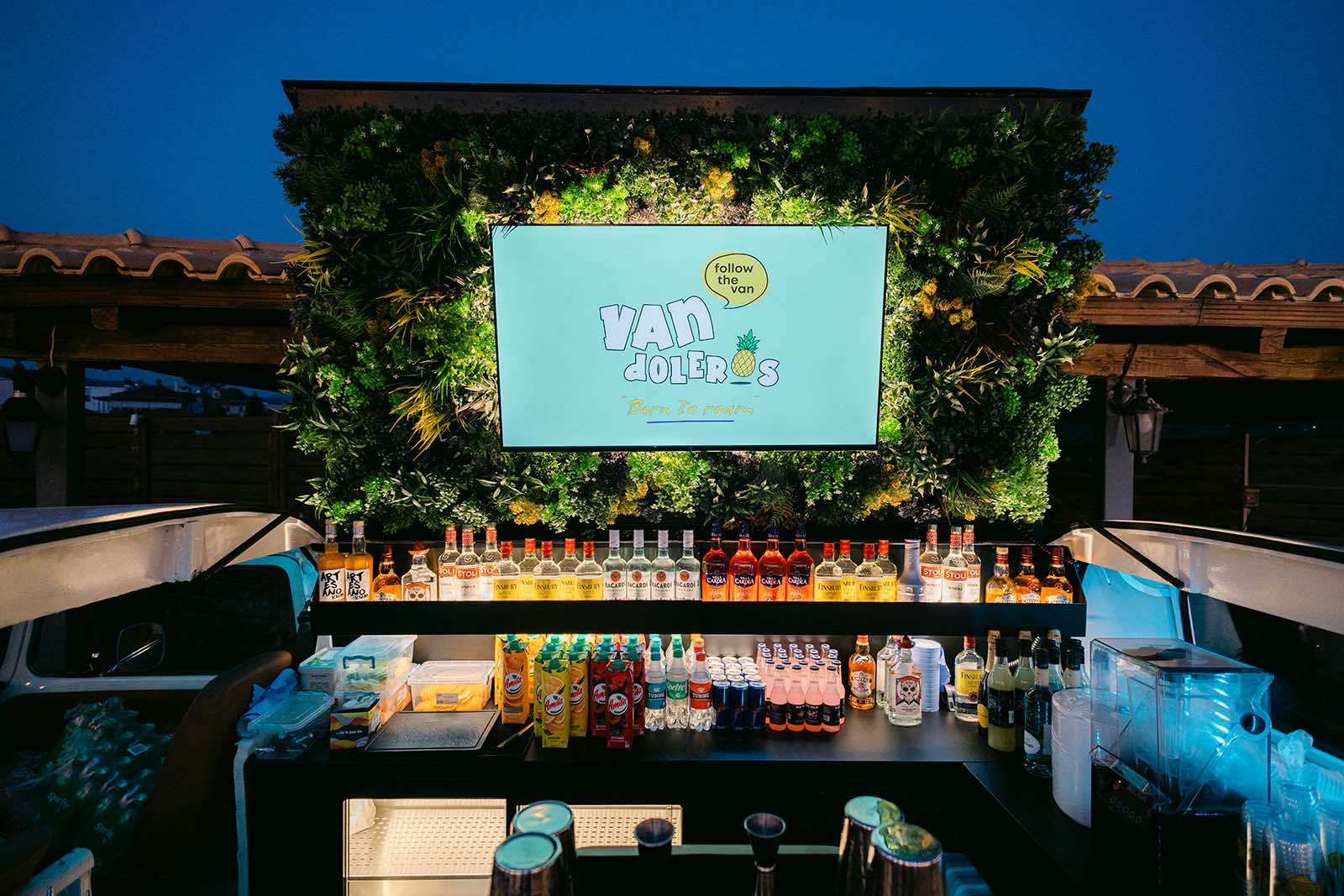 The Vandoleros cocktail bar with its green wall